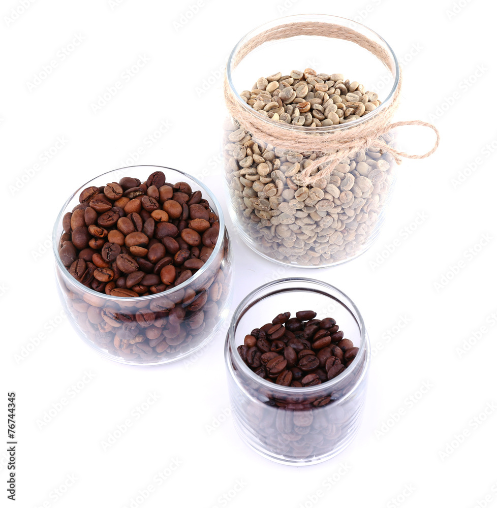 Coffee beans in glass jars isolated on white Coffee beans in glass jars isolated on white