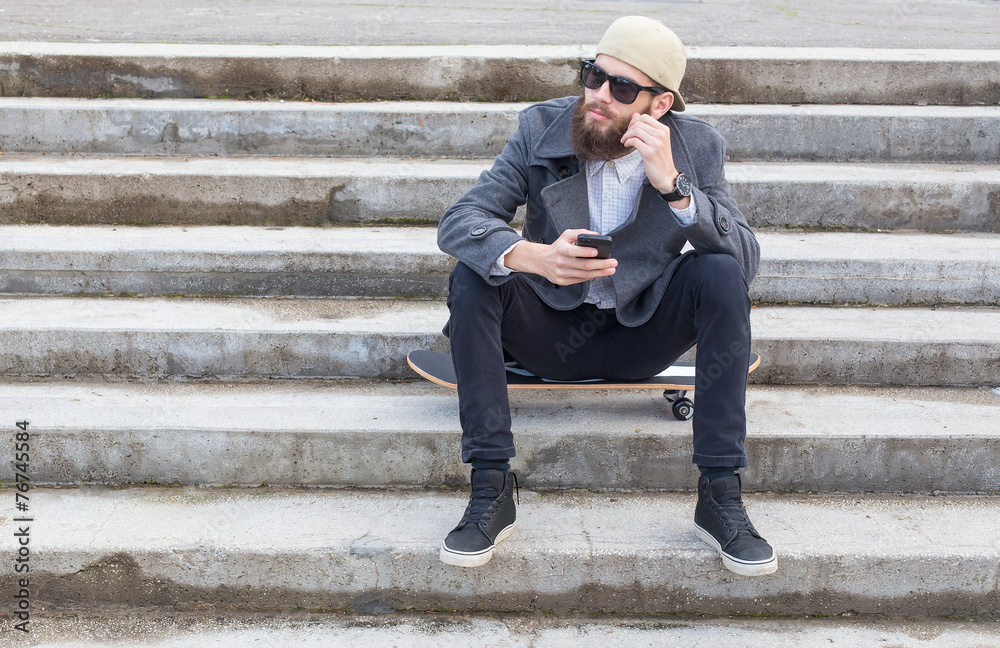Hipster with smartphone Hipster with smartphone