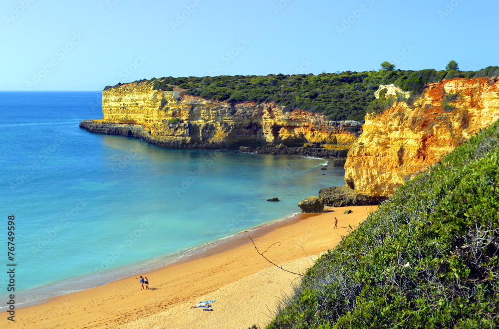 Spectacular cliffs on Senhora Da Rocha Nova Beach in Portugal