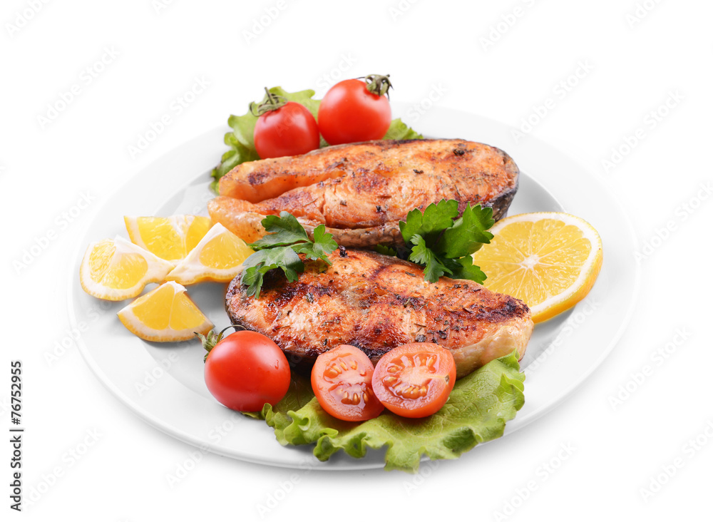 Tasty baked fish on plate isolated on white