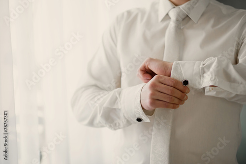 men wear a shirt and cufflinks