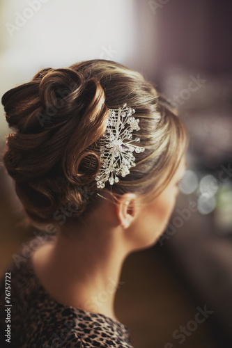 Bridal hairstyle with vintage style hair accessories.