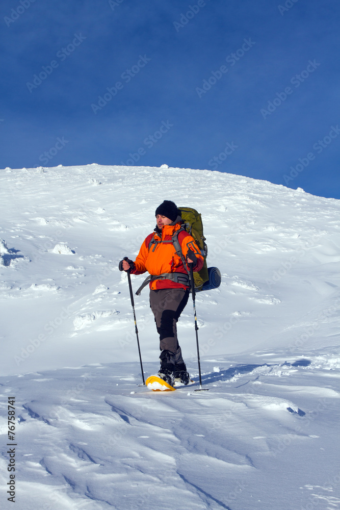 Winter hiking in snowshoes.