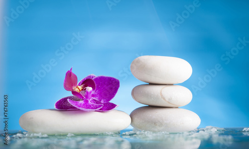 Photography Spa still life with pink orchid and white zen stone in a serenit