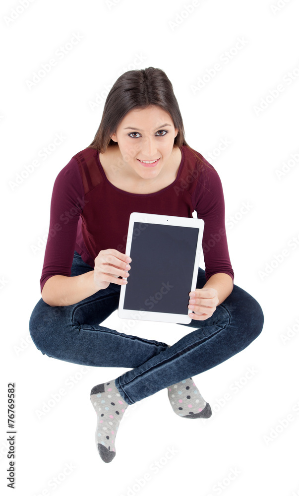 Naklejka premium Pretty girl showing her tablet