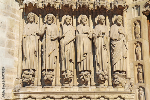 Statues of six apostles on the facade of Notre Dame cathedral