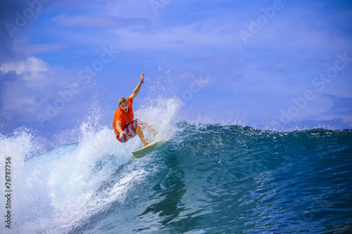 Surfer on Amazing Blue Wave © trubavink