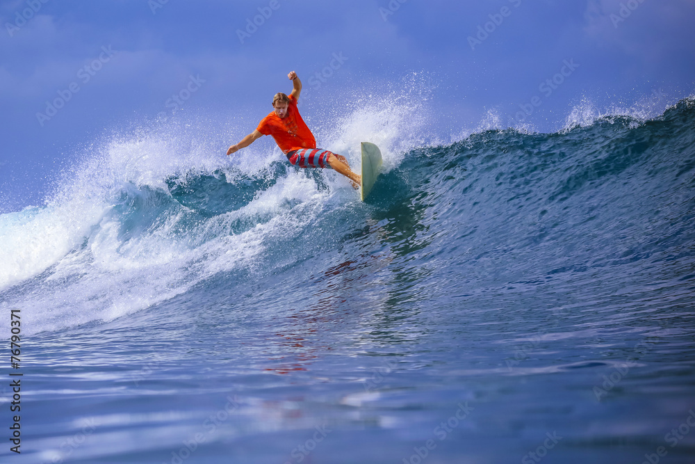 Surfer on Amazing Blue Wave