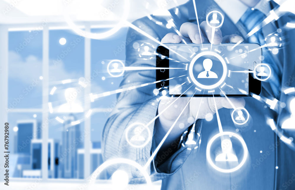 Fototapeta premium Business Hand holding a phone show the social network