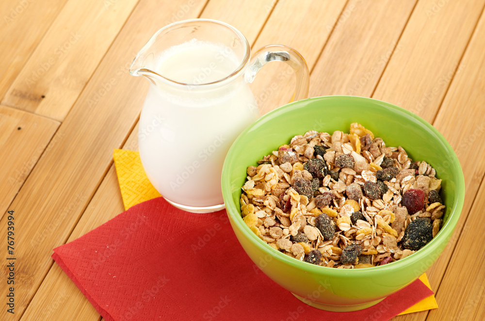Delicious and healthy cereal in bowl with milk Delicious and healthy cereal in bowl with milk