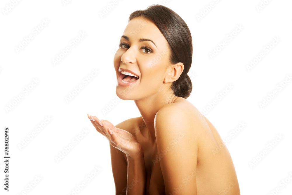 Portrait of nude woman laughing loud, looking at the camera Portrait of nude woman laughing loud, looking at the camera
