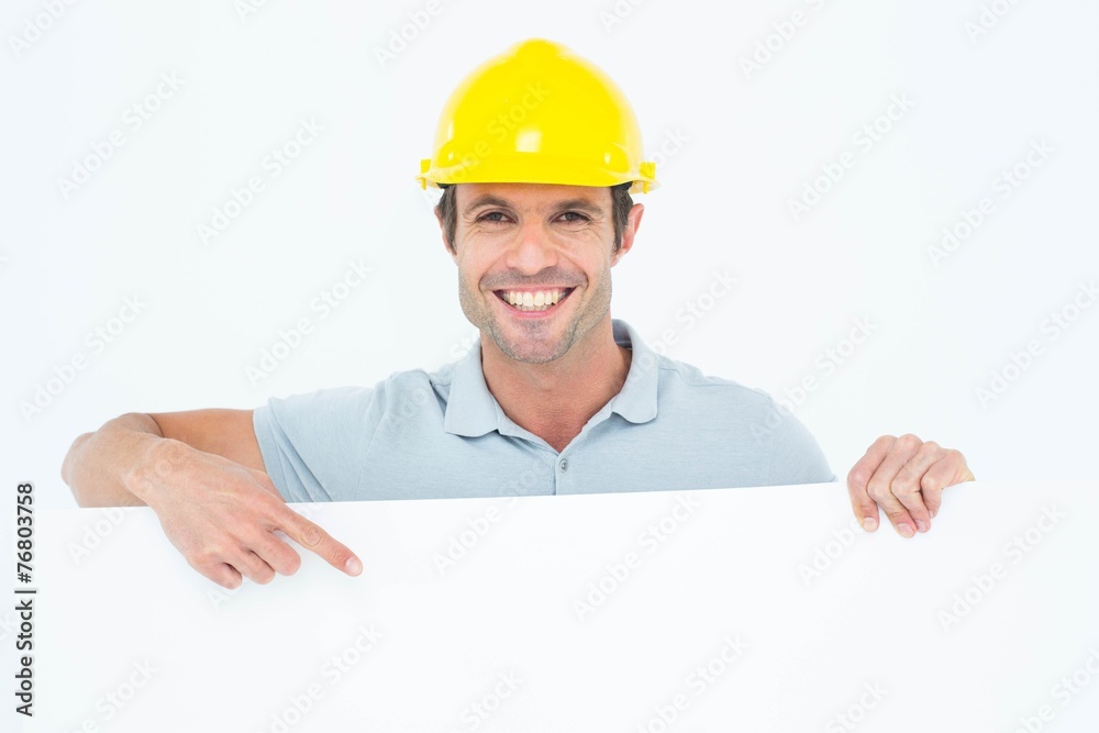 Architect with bill board over white background Architect with bill board over white background