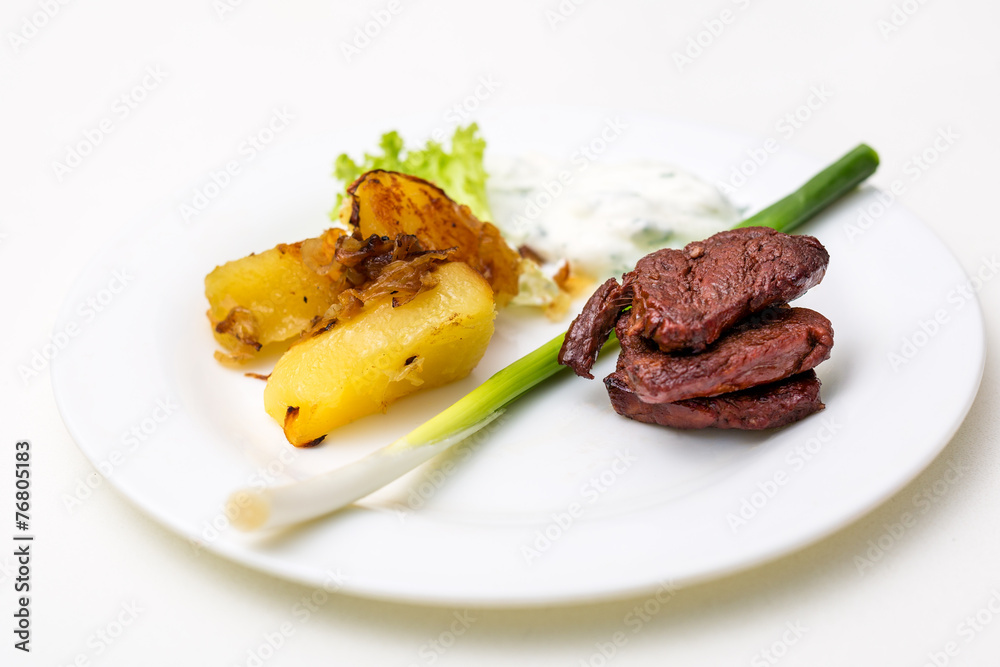 plate with beef and potatoes and gravy plate with beef and potatoes and gravy