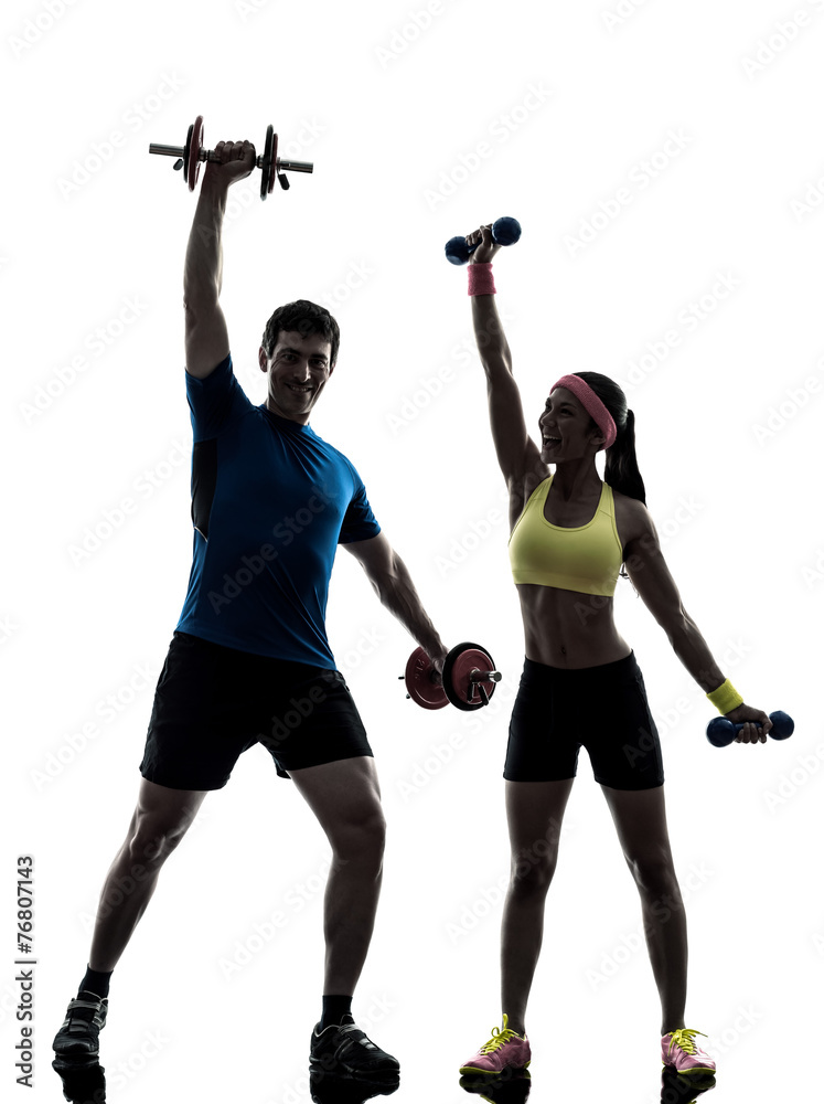 woman exercising fitness workout with man coach silhouette