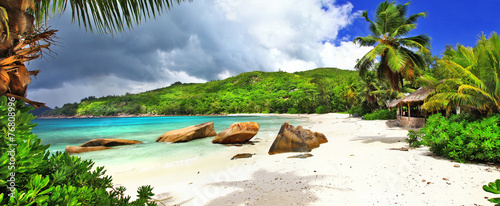 tropical holidays in Seychelles , panoramic view of Takamaka bea