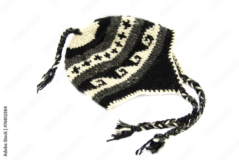 Fototapeta premium nepalese handmade knitted hat cap isolated on white