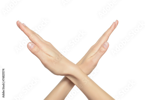 Obraz na płótnie Female crossing hands forming an x w salonie