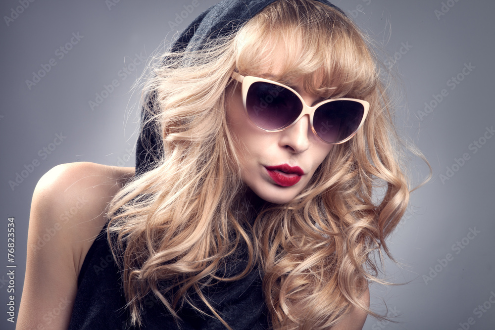 Fashionable blonde woman posing. Fashionable blonde woman posing.