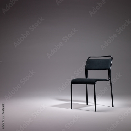 chair with blank space and dramatic light