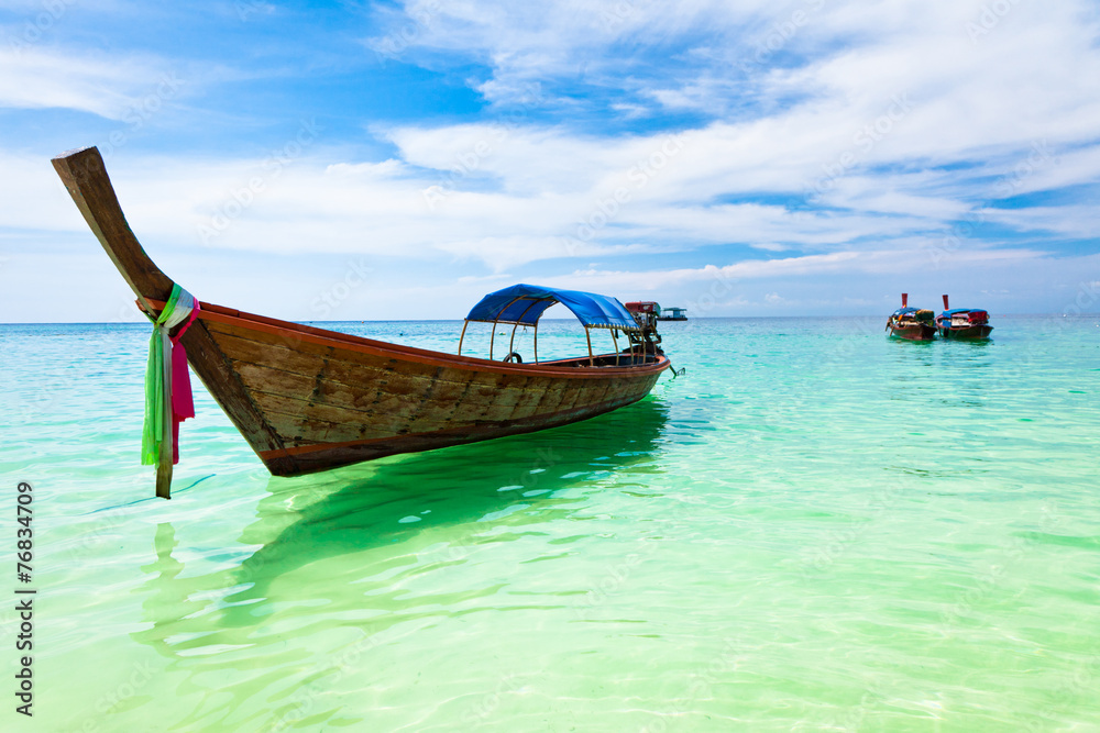 Traditional thai boat on the beach, Thailand.