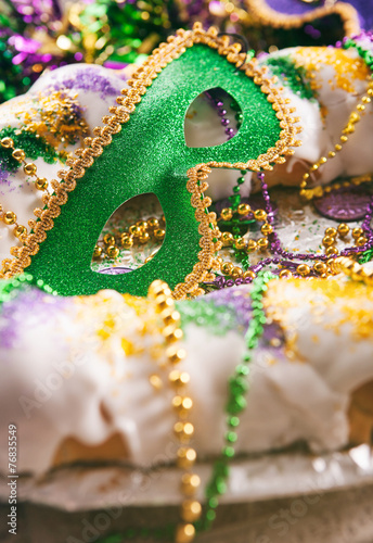 Mardi Gras: Green Mask Sits In Middle Of Traditional King Cake