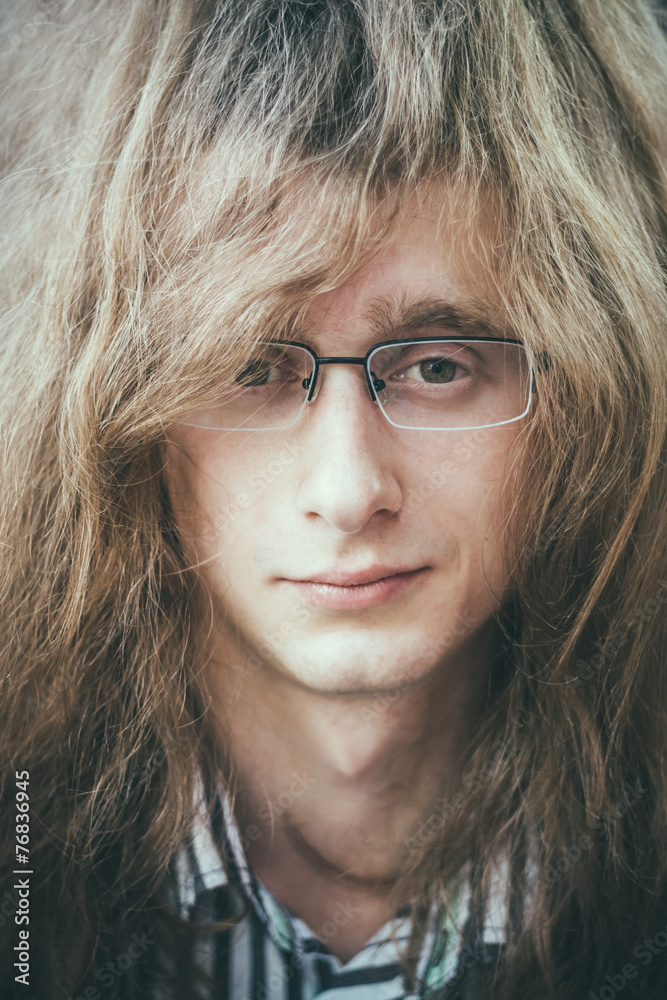 Portrait Of Rock Star Young Man Guy With Glasses And Long Hair Portrait Of Rock Star Young Man Guy With Glasses And Long Hair