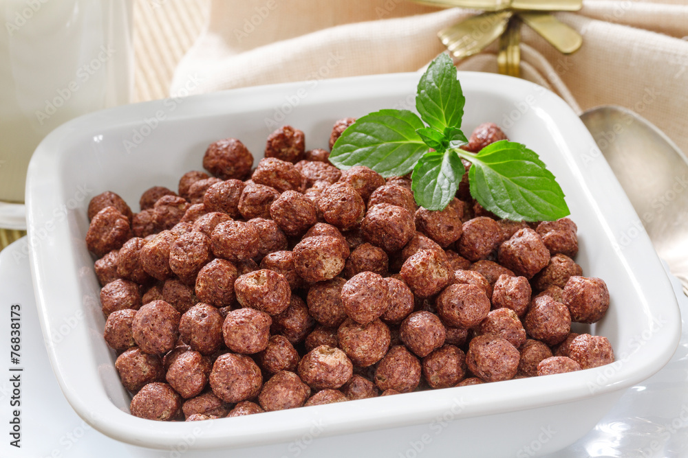 Cereal chocolate balls on wooden table Cereal chocolate balls on wooden table
