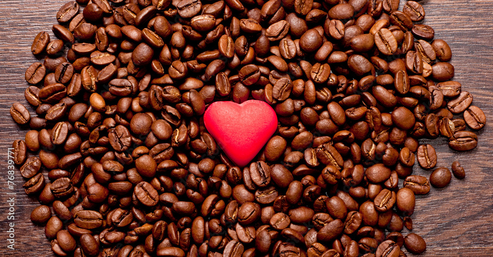red heart on coffee beans red heart on coffee beans