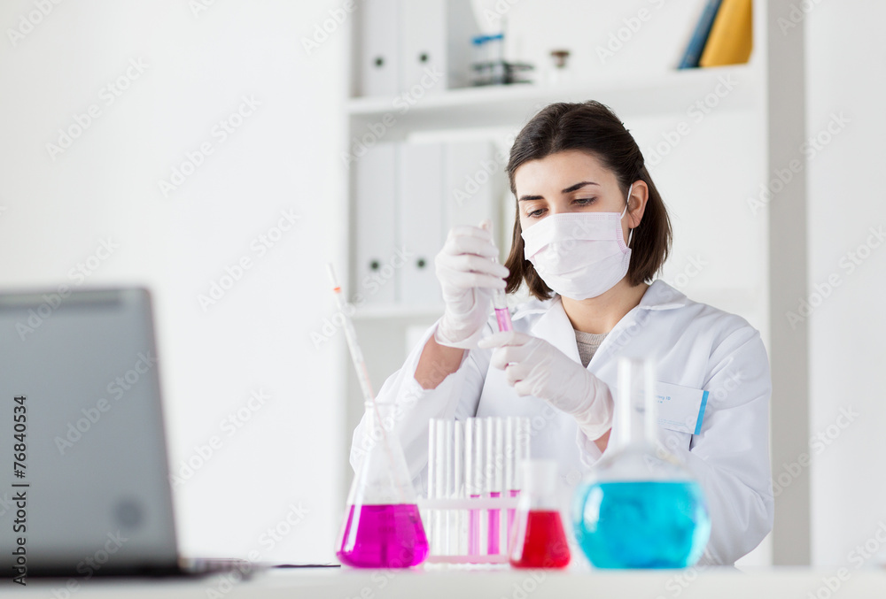 close up of scientist making test in lab close up of scientist making test in lab