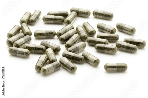 Homeopathic pills, alternative medicine. On a white background.
