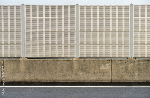 Noise barrier wall beside the highway