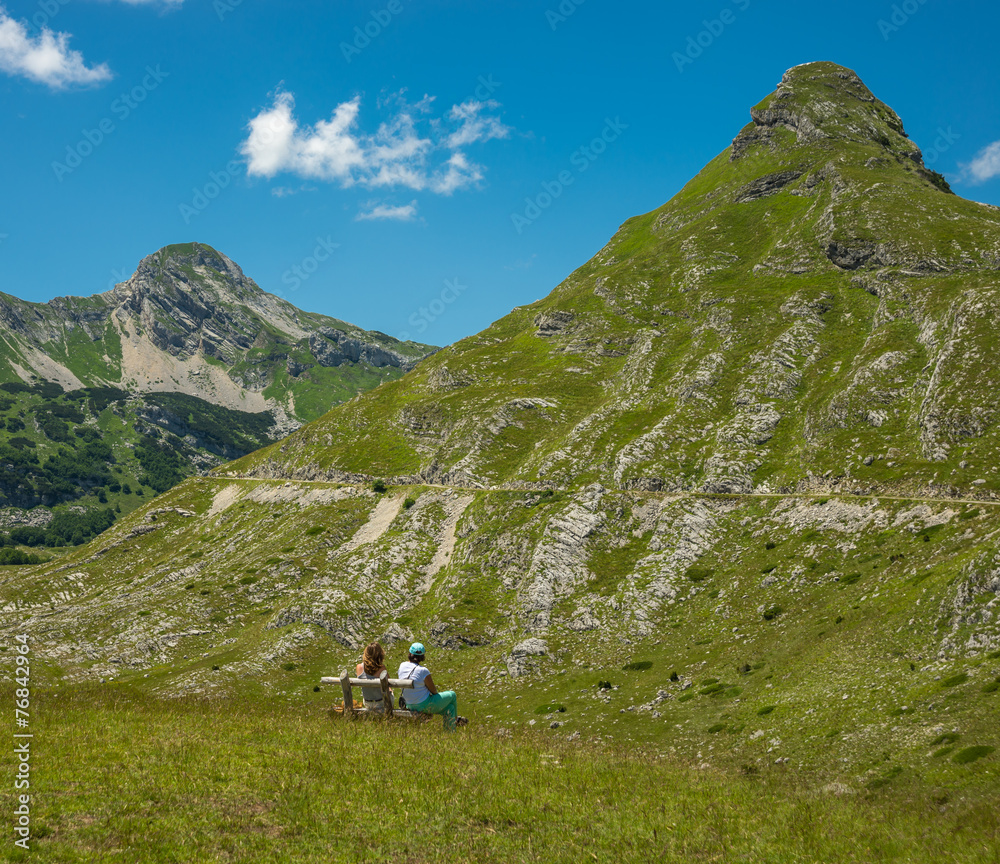 Two women looking at the mountain Durmitor