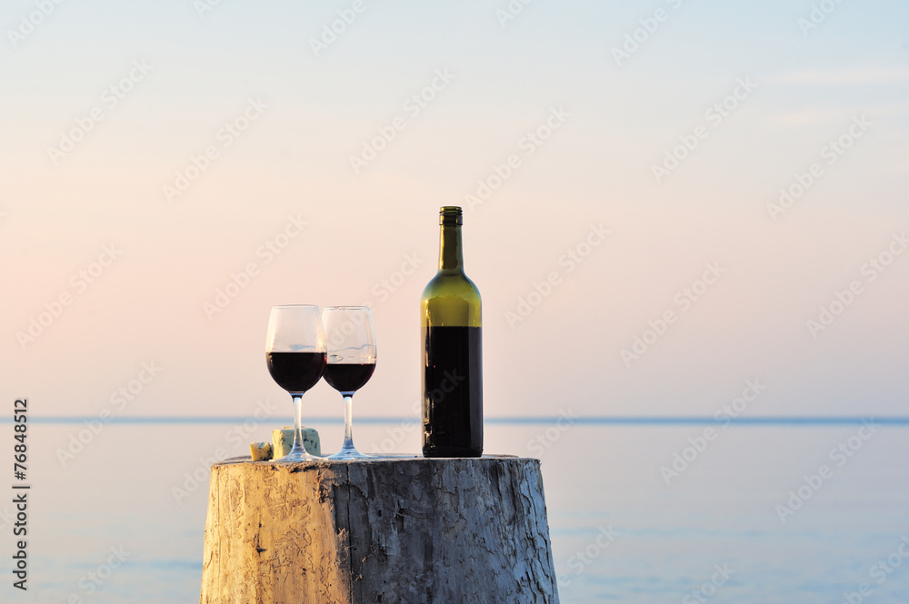 Red wine bottle and wine glasses Red wine bottle and wine glasses