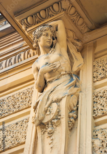 Caryatids sculpture decorates one of buildings of Petersburg