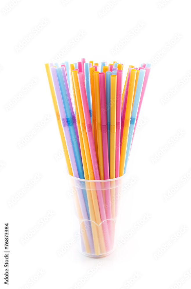 Many straws in plastic glass isolated on white Many straws in plastic glass isolated on white