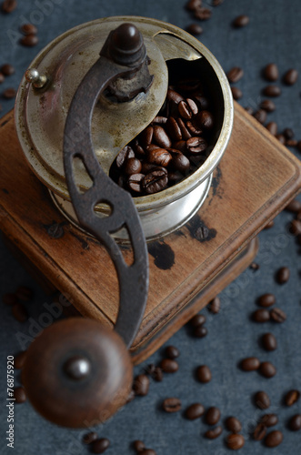 Coffee beans with vintage grinder