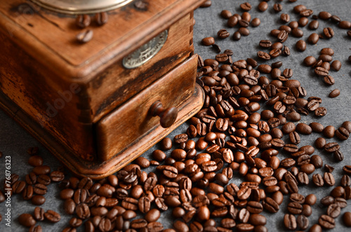 Coffee beans with vintage grinder