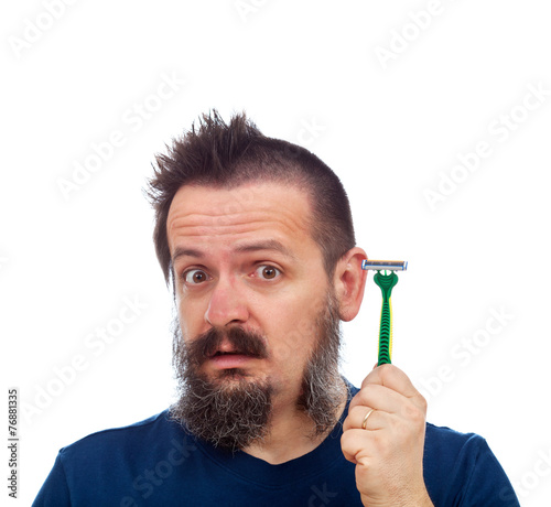 Man surprised by his safety razor efficiency