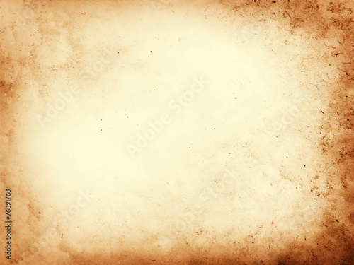 Old dirty parchment paper background texture photo