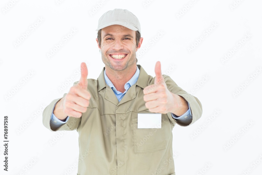 Happy delivery man gesturing thumbs up Happy delivery man gesturing thumbs up