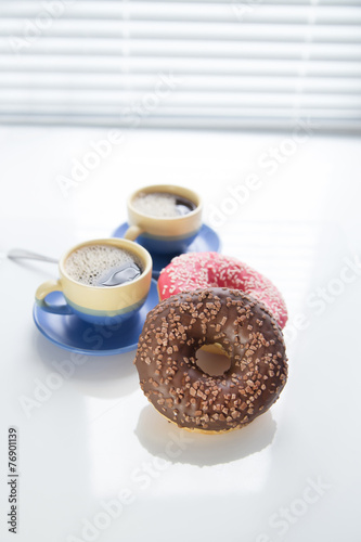 hot coffee and donut in morning. Soft vintage colors
