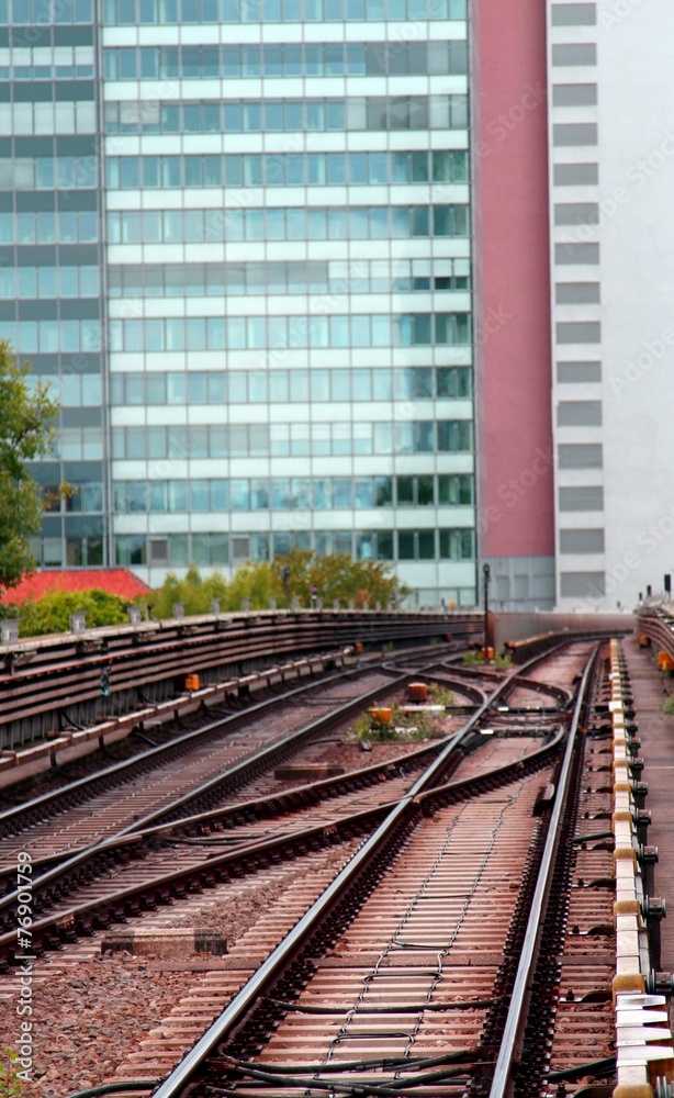 Fototapeta premium skyscraper and the rails of the train for commuter transport in