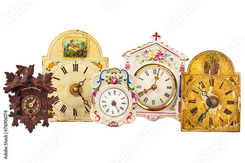 Different ancient clocks isolated on white