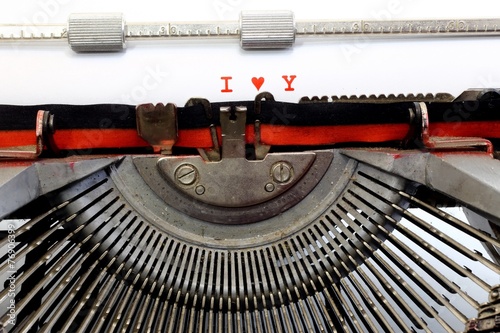 written typewriter I Love You with red ink