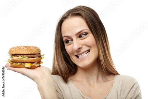 Young woman craving a burger