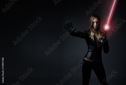 futuristic soldier with laser sword