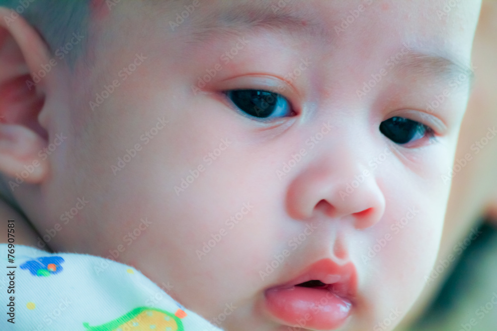 Close up of innocent face of young baby Close up of innocent face of young baby