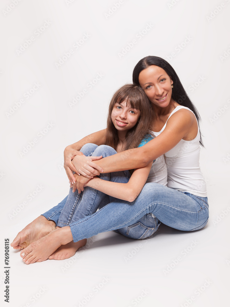 Portrait of a mother and daughter, family hug Portrait of a mother and daughter, family hug