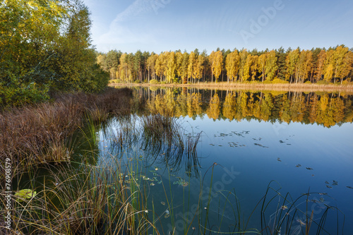Fototapeta Naklejka Na Ścianę i Meble -  Colorful autumn lake sunrise in north Poland