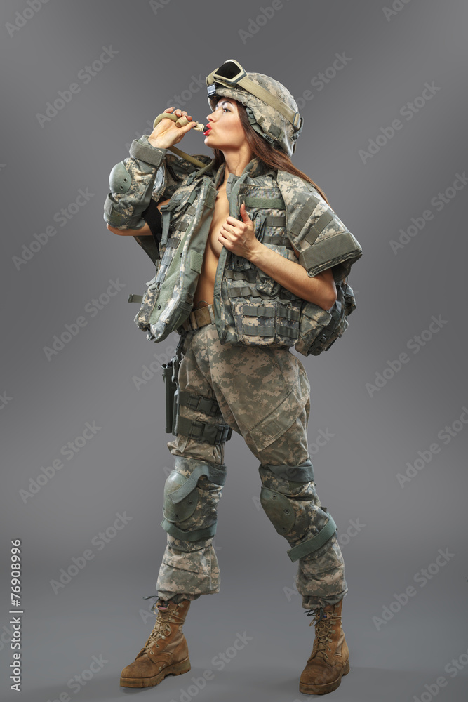 Sexy girl in the form of a soldier of the American division. Sexy girl in the form of a soldier of the American division.